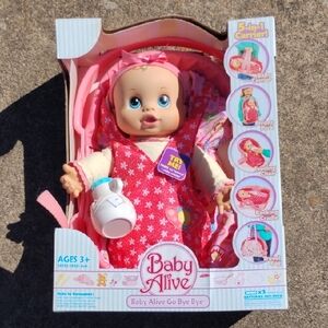 Baby Alive Go Bye Bye Doll with Pink Floral Outfit